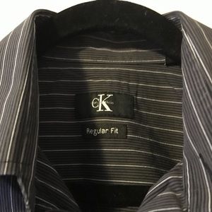 Men’s medium CK brand button up grey dress shirt